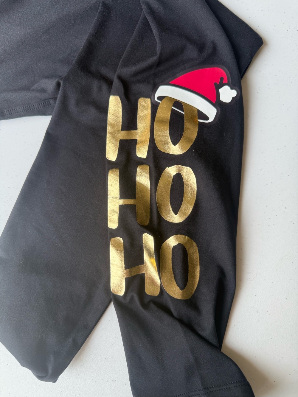LuLaRoe Black Leggings with Gold Foil HO HO HO and Red Santa Hat